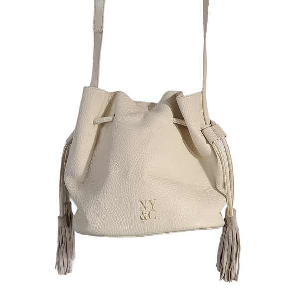 New York & Company Handbags - New York & Co. Tassel Bucket Crossbody Bag